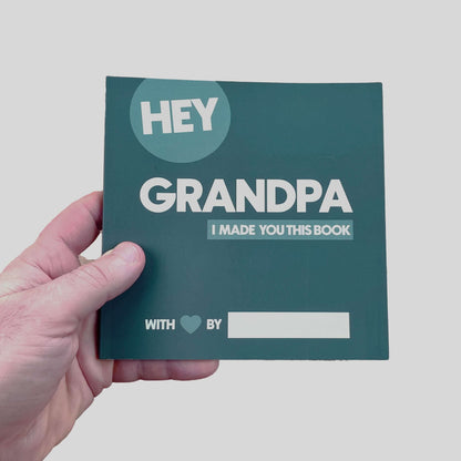 Person holding Hey Grandpa fill-in-the-blank memory book - personalized grandfather gift