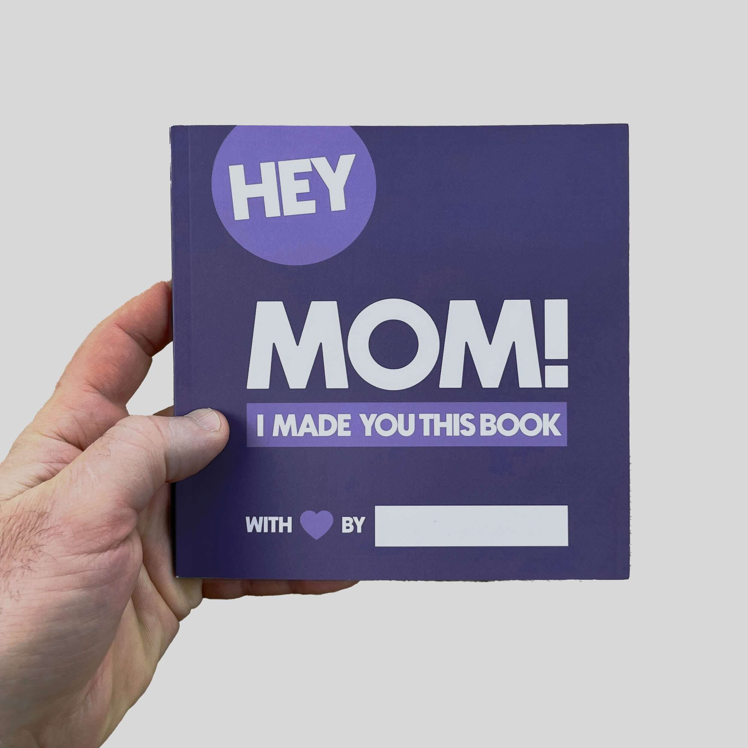 Person holding Hey Mom fill-in-the-blank memory book - personalized gift for mothers